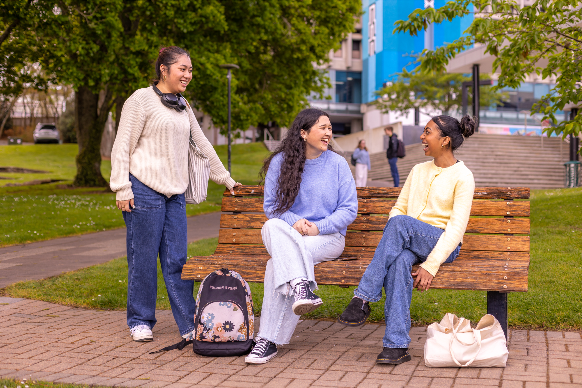 students-sitting-at-campus-green